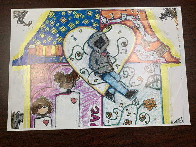 October What Home Means to Me Winner 2022. A drawing of a home with a heart in the middle.